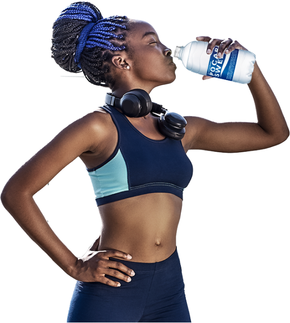 A young lady drinking a bottle of pocari sweat while working out