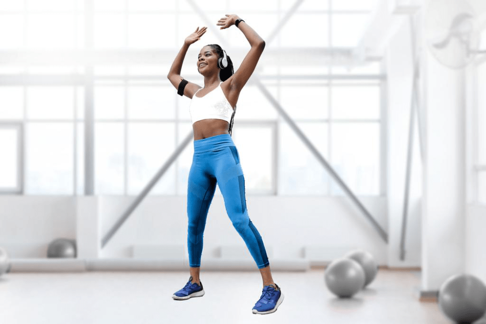 A young lady working out in a gym